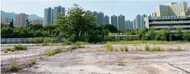  ?? ?? This plot in Tuen Mun is among four sites chosen in the New Territorie­s to build temporary flats under the “light public housing” scheme.