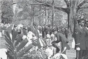  ?? PROVIDED BY JOHN MATEJOV ?? At the 1995 interment for the Baron 52 crew in Arlington National Cemetery, Mary Matejov receives an American flag for her son, Air Force Sgt. Joseph Matejov. He was on the flight shot down Feb. 4, 1973.