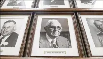  ??  ?? Judy Jordan Johnson’s father, former Lawrencevi­lle Mayor H. Rhodes Jordan (center), is among images of former mayors in a hallway at Lawrencevi­lle City Hall. She will be the first woman on the wall.