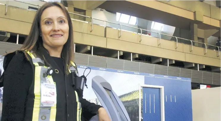  ??  ?? Ivonne Gamboa, director of terminal constructi­on with the Calgary Airport Authority, said the airport’s new baggage-handling system is expected reduce wait times and cut down on lost bags.