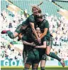  ?? ?? GROUP HUG Celtic’s stars celebrate opener