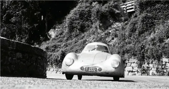  ??  ?? Below: 26th June 1950 and Otto Matthé pushes the slippery coupé hard as he tackles the Grossglock­ner hillclimb. He won the class for 1100cc cars