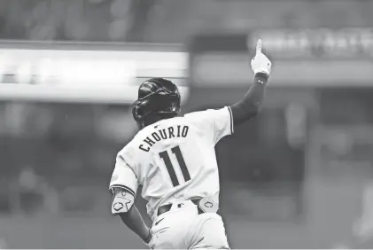  ?? STACY REVERE/GETTY IMAGES ?? Jackson Chourio of the Milwaukee Brewers runs the bases following his first major-league home run during the fifth inning against the Minnesota Twins on Wednesday at American Family Field.