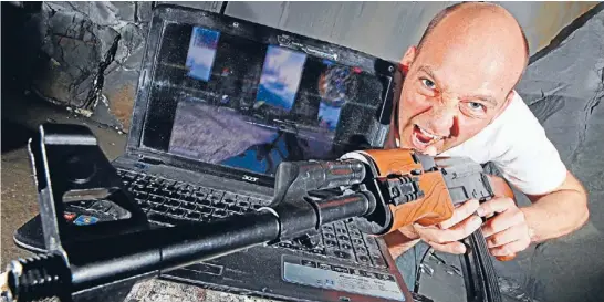  ?? Photo: Chris Skelton/fairfaxnz ?? Firing line: Lee Bennett put together a campaign to market his lifelike assault rifle game controller – including a slick video – but came unstuck when crowd-funding website Kickstarte­r rejected the pitch for being ‘‘too similar to a real gun’’.