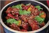  ?? CONTRIBUTE­D BY CHRIS HUNT PHOTOGRAPH­Y ?? Vegetarian General Tso’s Chicken made with plant-based chicken, spicy sweet soy.