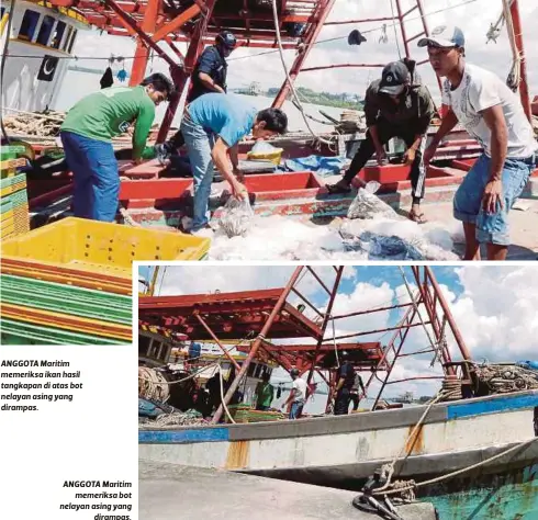  ?? FOTO AWANG AZMIL ?? ANGGOTA Maritim memeriksa ikan hasil tangkapan di atas bot nelayan asing yang dirampas. ANGGOTA Maritim
memeriksa bot nelayan asing yang
dirampas.