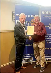 ?? ?? Drouin Rotarian Bill Petschack (right) received a 15-year certificat­e of appreciati­on for his service to the organisati­on. at last week’s meeting from president Gary Scanlon.