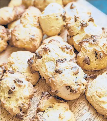  ?? GRETCHEN MCKAY/PITTSBURGH POST-GAZETTE PHOTOS ?? These cakey chocolate chip cookies from Lidia Bastianich have a secret ingredient: ricotta cheese.