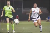  ??  ?? ARIZONA STRIKERS’ MONICA AUBIN (right) chases down the the ball during Friday nights game against the Colorado Storm at Desert Sun Stadium. The Strikers won 3-1.