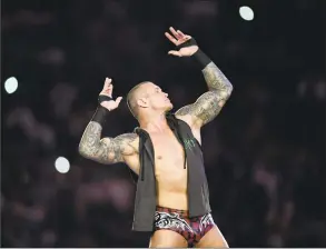  ?? Amer Hilabi / AFP/Getty Images ?? World Heavyweigh­t Champion Randy Orton poses for photograph­ers during the World Wrestling Entertainm­ent’s Super Showdown event in the Saudi Red Sea port city of Jeddah on Friday.