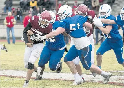  ?? SENTINEL & ENTERPRISE FILE PHOTOS ?? Fitchburg’s Monty Graham tries to escape a tackle by Leominster’s Kyle Philbin during the 2019 Thanksgivi­ng Day game. The teams will meet for the first time since that contest on March 26. Below, Leominster’s Bryant Cordero carries the ball during that game.