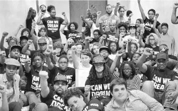  ?? COURTESY OF CURTIS HIERRO ?? Curtis Hierro, front right corner, staged in at a sit-in at the governor’s office in Tallahasse­e on Aug. 13, 2013. After George Zimmerman was acquitted, protesters occupied the hallway for 31 days, demanding a repeal of Florida’s “stand your ground” law.