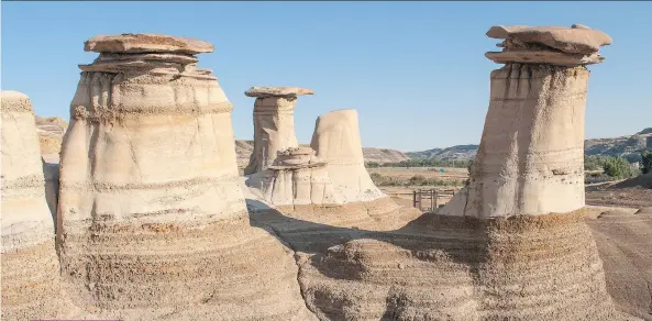  ?? CHRIS BRUNEAU ?? Hoodoos are stunning sedimentar­y stacks formed by wind, water and sand. They are so fragile, they can erode if their capstones are moved.