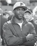  ?? AP Photo/John Bazemore, File ?? Former Atlanta Falcons quarterbac­k Michael Vick stands on the sidelines before the first half between the Falcons and the New Orleans Saints on Jan. 1 in Atlanta.