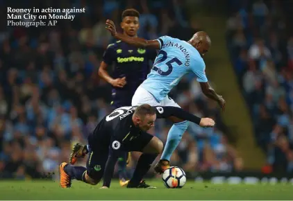  ??  ?? Rooney in action against Man City on Monday Photograph: AP