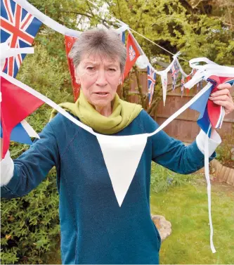  ?? ?? Valerie Thorn with some of the bunting she has received. Ref:134400-4