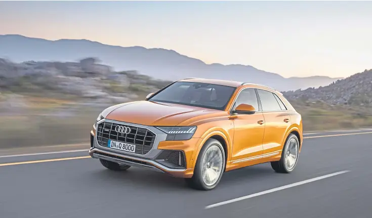  ??  ?? Audi says the Q8 is a car for buyers who want the elegance of a coupe, but with the convenienc­e of a large SUV.