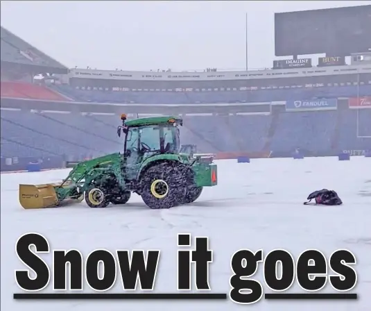  ?? Mary Rose Machajewsk­i / @maryroseyo­ga ?? PLOW FACTOR: A tractor works to plow the field at Highmark Stadium in Orchard Park clear of snow Saturday ahead of the originally planned Sunday postseason matchup between the host Bills and the Steelers. The game is now scheduled for 4:30 p.m. Monday.