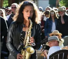  ?? PHOTO PROVIDED PHOTO CREDIT: TIM PARSONS ?? Vanessa Collier plays her saxophone during an outdoor show.