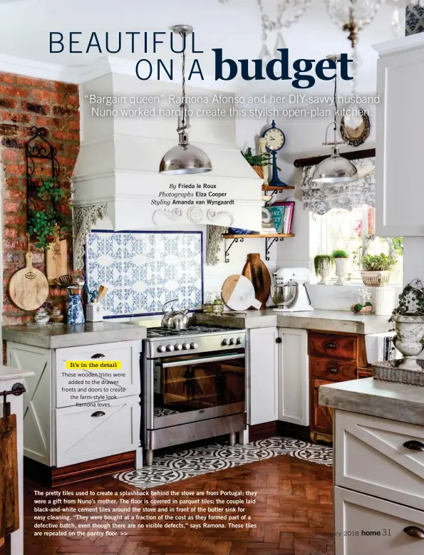  ??  ?? The pretty tiles used to create a splashback behind the stove are from Portugal; they were a gift from Nuno’s mother. The floor is covered in parquet tiles; the couple laid black-and-white cement tiles around the stove and in front of the butler sink...