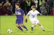  ?? DAVID M. JOHNSON - DJOHNSON@DIGITALFIR­STMEDIA.COM ?? CBA’s Gustavo Rigatos (10) shields the ball from Shen’s Ethan Brunell in the second half of the Section II Class AA boys soccer championsh­ip Oct. 20, 2017 at Colonie High School.