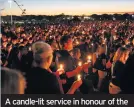  ??  ?? A candle-lit service in honour of the 17 who died in the Florida shooting