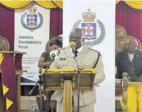  ?? (Photos: Kasey Williams) ?? Head of the Manchester police Superinten­dent Shane Mccalla addressing the division’s church service and awards ceremony in Knockpatri­ck on Sunday.