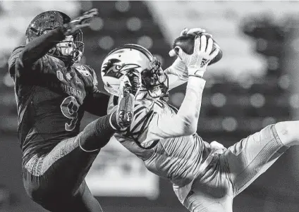  ?? Photos by William Luther / Staff photograph­er ?? As in last year’s bowl loss to Louisiana, WR Zakhari Franklin and UTSA were short-handed Tuesday against San Diego State.