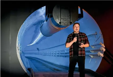  ?? AP ?? Elon Musk speaks during an unveiling event for the Boring Co’s Hawthorne test tunnel.