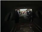  ?? BRYNN ANDERSON — THE ASSOCIATED PRESS ?? Mortician Cordarial O. Holloway, foreground left, funeral director Robert L. Albritten, foreground right, and funeral attendants Eddie Keith, background left, and Ronald Costello place a casket into a hearse in Dawson, Ga.