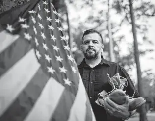  ?? Marie D. De Jesús / Staff photograph­er ?? Chris Hernandez, 50, a Houston-area veteran of wars in Iraq and Afghanista­n, was in a state of shock Sunday as news broke that Kabul had collapsed.