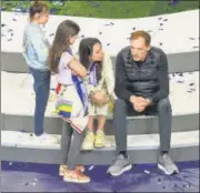  ?? GETTY IMAGES ?? Chelsea manager Thomas Tuchel sits with his family after winning the Champions League final.