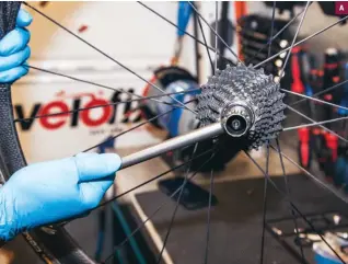  ??  ?? below left Make sure the cassette is tight
below right Align the derailleur hanger