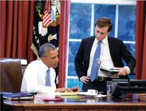  ??  ?? David Litt, seen here working with President Obama, became a White House speechwrit­er at only 24.