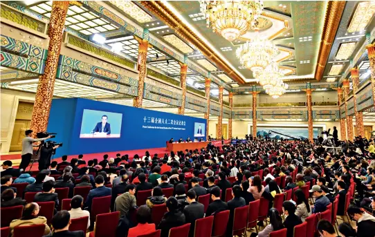  ?? Dong Ning ?? On March 15, 2019, at the Great Hall of the People in Beijing, Premier Li Keqiang addresses Chinese and foreign reporters and takes their questions at a press conference of the Second Session of the 13th National People’s Congress.