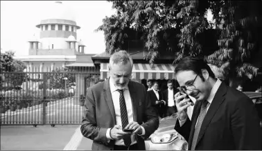  ?? AP ?? Italian Ambassador to India Lorenzo Angeloni (left) outside the Supreme Court in New Delhi, Wednesday.