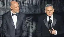  ?? KEVIN WINTER, GETTY IMAGES ?? Neil Meron, left, and Craig Zadan, whose
credits as producers include NBC’s Peter Pan Live!
and The Sound of Music Live!, were fans of the original Broadway show
The Wiz.