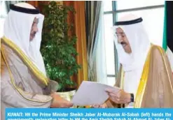  ?? — KUNA ?? KUWAIT: HH the Prime Minister Sheikh Jaber Al-Mubarak Al-Sabah (left) hands the government’s resignatio­n letter to HH the Amir Sheikh Sabah Al-Ahmad Al-Jaber AlSabah yesterday.