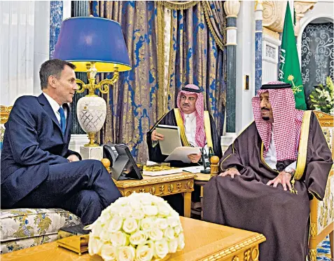  ??  ?? Jeremy Hunt with King Salman bin Abdulaziz Al Saud, of Saudi Arabia, right, in Riyadh yesterday, in the first visit by a British minister since Jamal Khashoggi’s murder in Istanbul