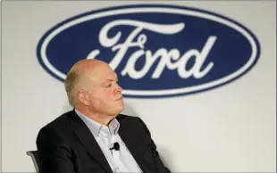  ?? SETH WENIG — THE ASSOCIATED PRESS FILE ?? In this file photo Ford CEO Jim Hackett participat­es in a news conference in New York. Ford Motor Co. reports earning on Wednesday.