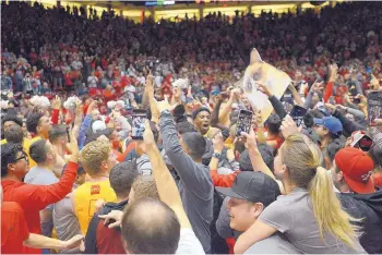  ?? ADOLPHE PIERRE-LOUIS/JOURNAL ?? For now on for fans at New Mexico football and basketball games there will be contactles­s ticketing, which will save the school money.