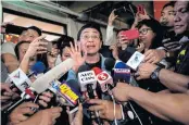  ?? AFP ?? Philippine journalist Maria Ressa gives a statement after posting bail at a regional trial court in Manila yesterday.