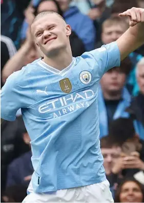  ?? ?? Manchester City striker Erling Haaland celebrates his goal.
PLAYING TODAY
TOMORROW
SATURDAY:
PLAYED YESTERDAY
