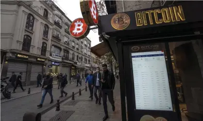  ?? ?? A cryptocurr­ency exchange kiosk in Istanbul. Photograph: Bloomberg/Getty Images