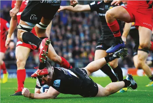  ?? PICTURES: Getty Images ?? Charge down: Luke Cowan-Dickie falls over the line for Exeter’s first try