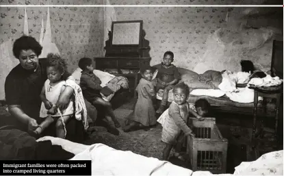  ??  ?? Immigrant families were often packed into cramped living quarters