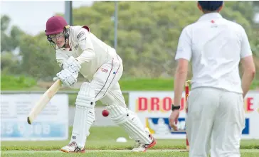  ??  ?? Josh Maric looks to turn this ball onto the leg side in the Division 1 clash between Drouin and Neerim District which got underway after some early rain.