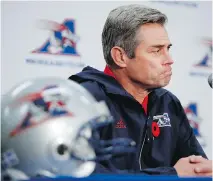  ?? ALLEN MCINNIS ?? Alouettes interim head coach Jacques Chapdelain­e listens to a question from the media in Montreal on Sunday.