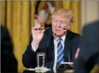  ??  ?? President Donald Trump speaks in the East Room of the White House in Washington on Tuesday during a meeting with the Republican House whip team about the proposed health bill.