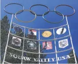  ?? Haven Daley / Associated Press ?? The Olympic rings stand atop a sign at the entrance to the Squaw Valley Ski Resort in Olympic Valley in July. The resort owner has pledged to change its name.